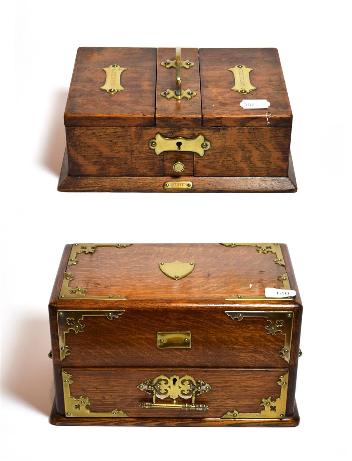 Lot 140 - An oak brass mounted humidor together with a similar cigarette box
