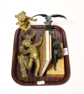 Lot 172 - A late 19th century bronze figure of Chronos, the winged figure seated holding a scythe and...