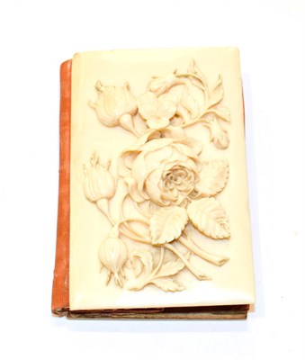 Lot 185 - A Chinese carved Ivory aid-memoire, second half 19th century, oblong, the cover carved with flowers