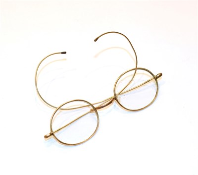 Lot 187 - A pair of glasses, stamped '10CT'