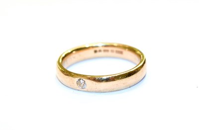 Lot 188 - A 9 carat gold diamond band ring, finger size N