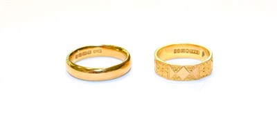 Lot 203 - Two 22 carat gold band rings, finger sizes J and L