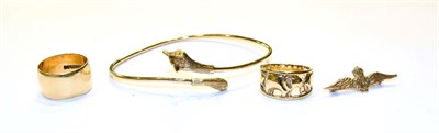 Lot 210 - Two 9 carat gold rings, differing designs, finger sizes N, an RAF brooch, stamped '9CT' and a 9...