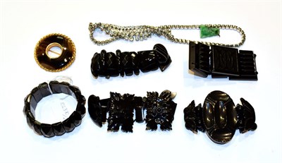Lot 211 - Five jet bracelets, a jade pendant, a brooch and a paste necklace