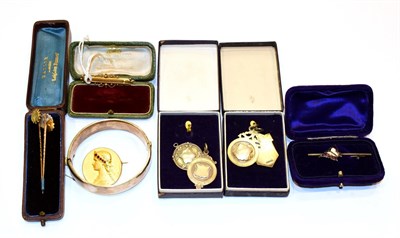 Lot 218 - A 9 carat gold sapphire and diamond bar brooch, length 4.5cm, three stick pins including a...