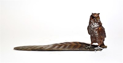 Lot 245 - An Austrian cold-painted bronze inkwell, owl standing on a feather, stamped, 13.5cm high by...