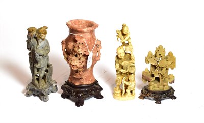 Lot 253 - Three Chinese soapstone carvings, the largest of a twin handled vase decorated with flower...