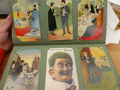 Lot 257 - Two early 20th century postcard albums, North of England subjects with an empty album and...