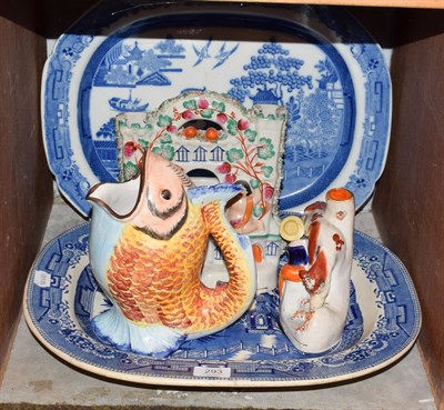 Lot 293 - Two 19th century blue and white meat plates, two Staffordshire figures, one as a watch holder...