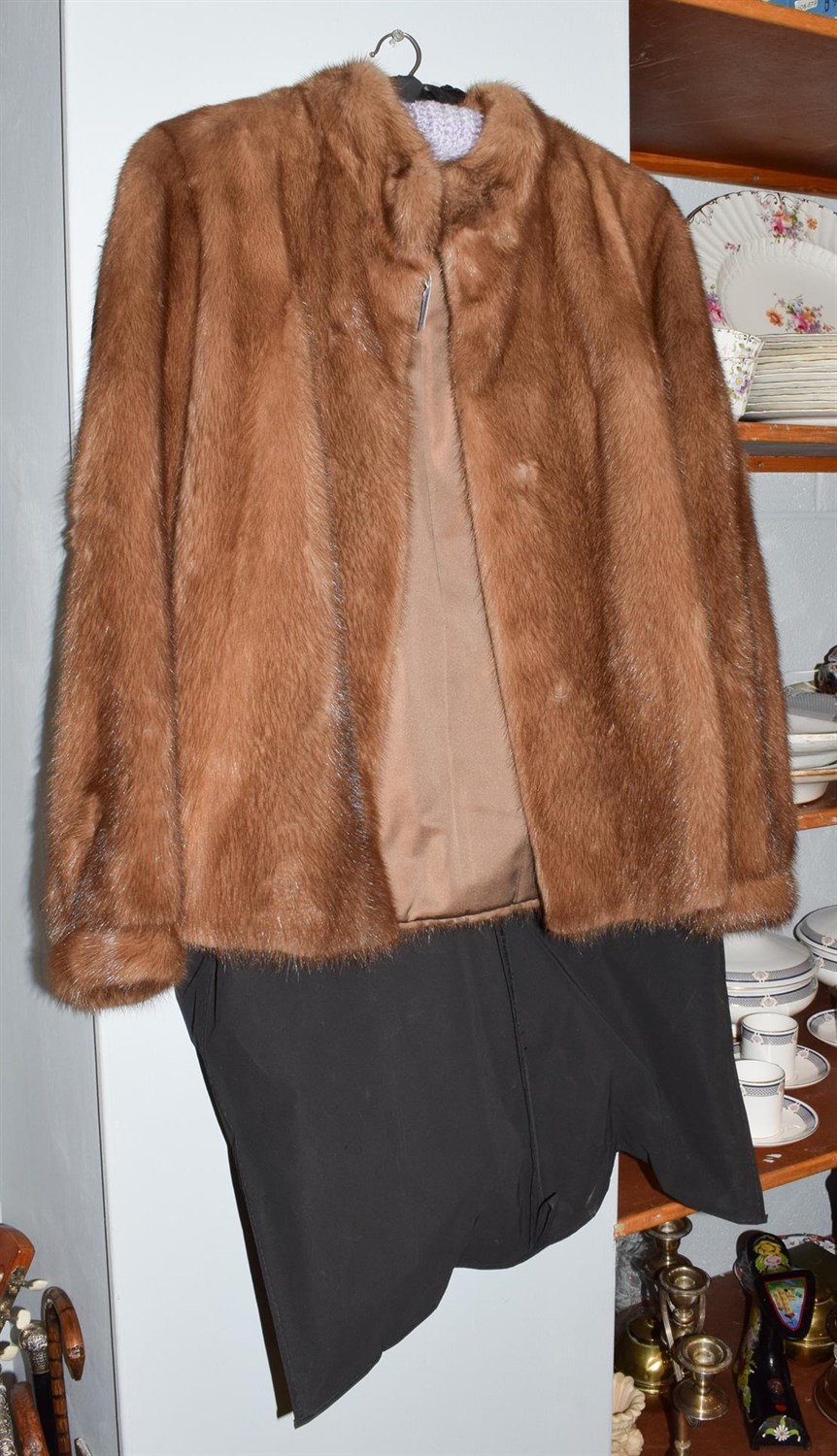 Lot 310 - A light brown mink jacket