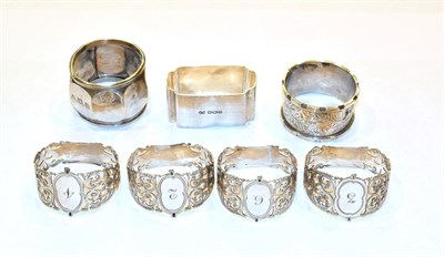 Lot 334 - A set of four Victorian silver napkin-rings, by Arthur Priestley and Co., Sheffield, 1899, each...