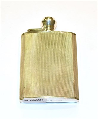 Lot 340 - A George VI silver hip-flask, by F. Burton Crosbee, Birmingham, 1939, oblong and with engine turned