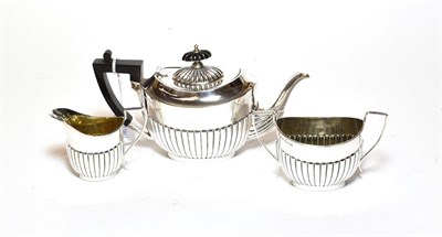 Lot 346 - A three-piece Victorian silver tea service, by John Henry Potter, Sheffield, 1895, each piece...