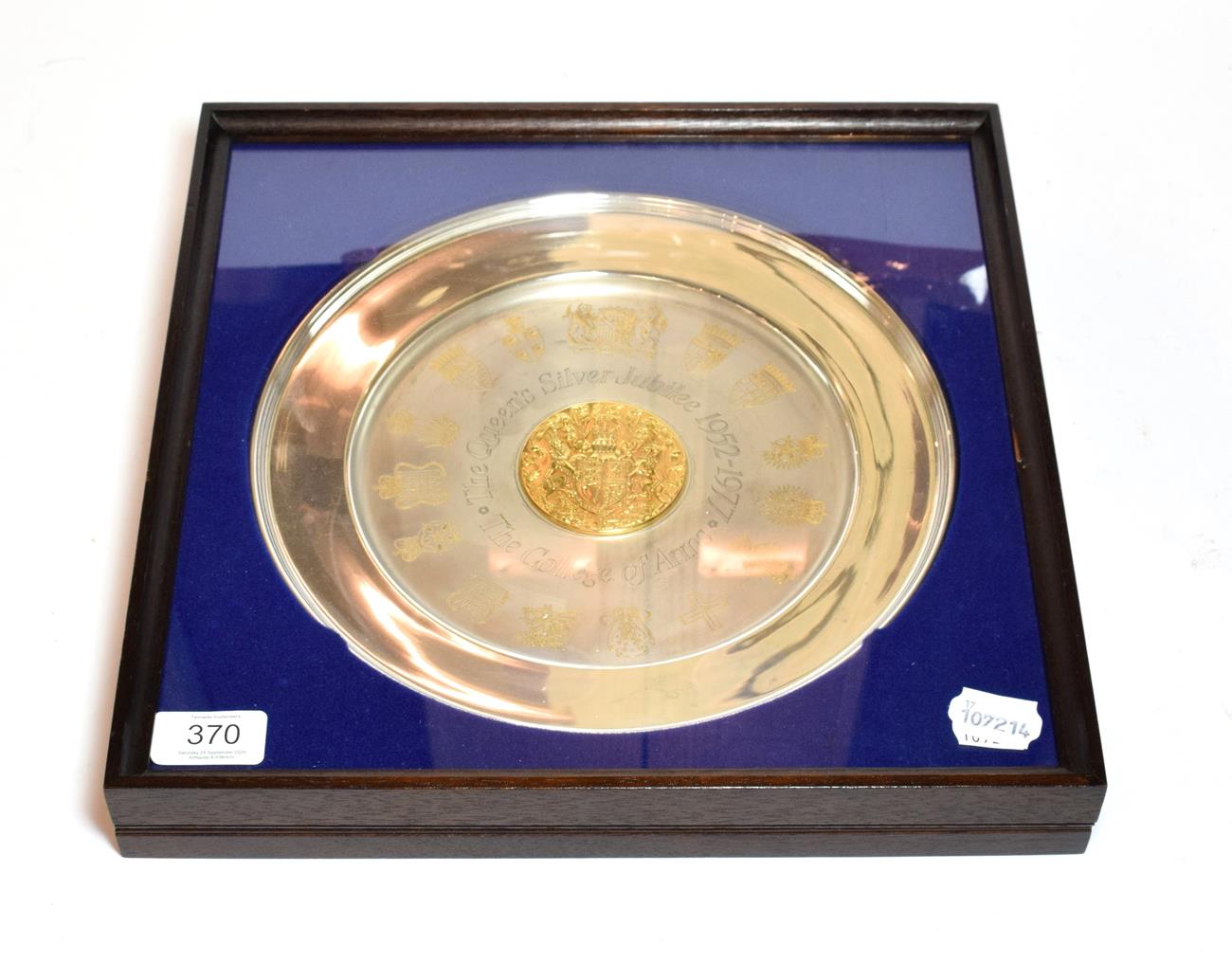 Lot 370 - An Elizabeth II parcel-gilt silver plate, by