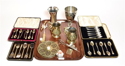 Lot 372 - A quantity of silver and silver plate, the silver comprising, three cased set of teaspoons, one set