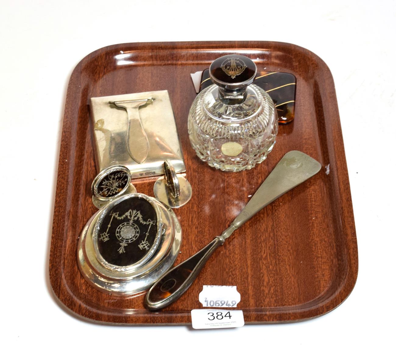 Lot 384 - A collection of assorted silver and tortoiseshell items, including a desk-clip, by William...