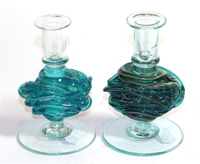 Lot 433 - Two Mdina trailed knop candlesticks, in blue, yellow and turquoise, one signed Mdina, 15.5cm high