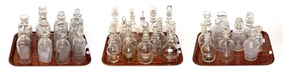 Lot 457 - A quantity of early 19th century and later decanters and liqueur bottles including triple-ring neck