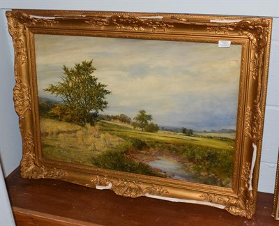 Lot 1013 - R* Wood (19th/20th century), Extensive rural landscape with hay stacks, signed and dated 1889,...