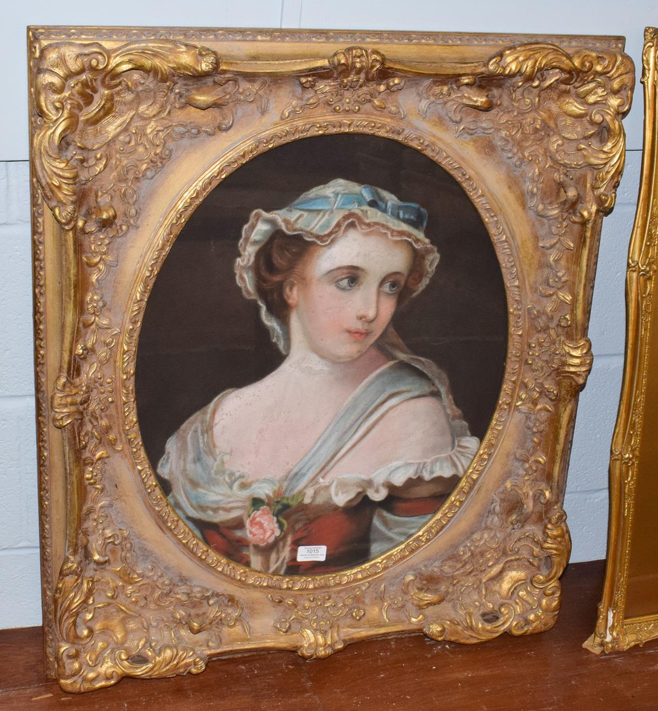Lot 1015 - British School (19th century) Portrait of a young lady with a bonnet and flower in her dress,...