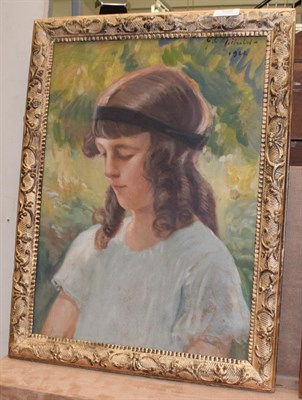 Lot 1046 - Attributed to Georges Michelet (b.1873) French, portrait of a young girl wearing a black...