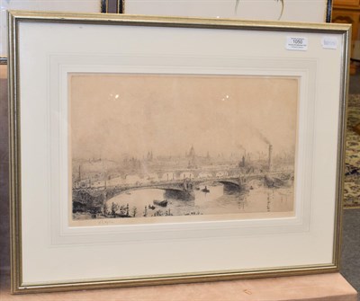 Lot 1050 - William Lionel Wyllie RA, RBA, RE, RI, NEAC (1851-1931), ''Thames Bridge, St Pauls beyond''...