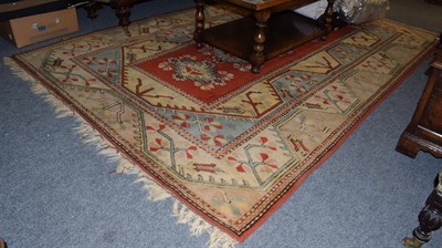 Lot 1092 - Melas carpet, the brick red field with a column of diamond medallion enclosed by borders of angular