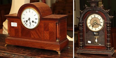 Lot 1111 - A mahogany early 20th century striking mantel clock and an American alarm mantle timepiece (2)