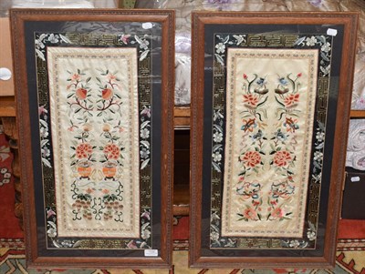Lot 1126 - Pair of Chinese export floral silk work embroideries in oak frames