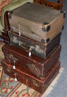 Lot 1133 - Three brown crocodile leather travel cases, one with dust cover, case stamped A. Barrett & Sons. 63