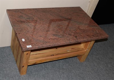 Lot 1190 - A pine coffee table with a marble top
