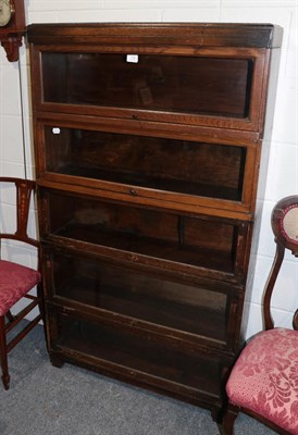 Lot 1196 - A Globe Wernicke ''classic'' five-tier glazed oak bookcase
