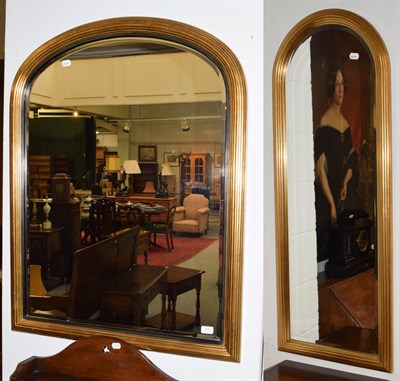 Lot 1201 - A gilt mirror with arch reeded frame and another (2)