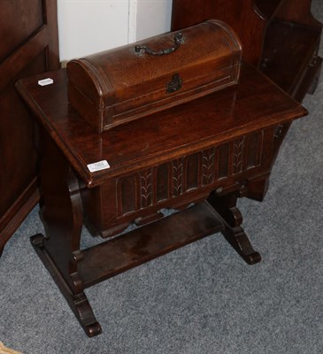 Lot 1203 - A reproduction oak work table with hinged lid and a reproduction faux leather dome top box (2)