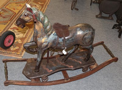 Lot 1212 - A painted rocking horse