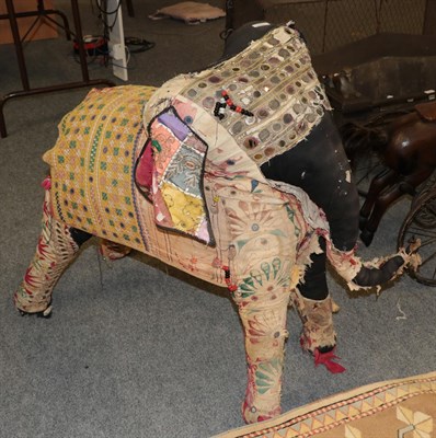 Lot 1216 - A 20th century Indian fabric covered and stuffed figure in the form of an Elephant with various...