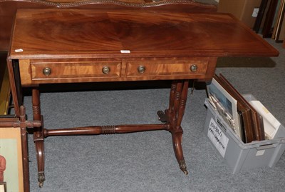 Lot 1217 - A reproduction mahogany and ebony strung sofa table