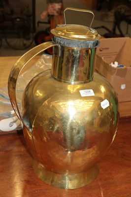 Lot 1238 - A Jersey style brass milk jug