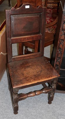 Lot 1242 - A 17th century panel back oak chair