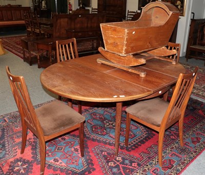 Lot 1257 - A G-plan dining table with four G-Plan chairs