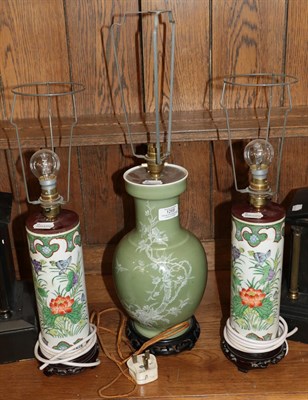 Lot 1268 - A pair of Chinese Famille verte sleeve vases, converted in to lamps and another celadon glaze...