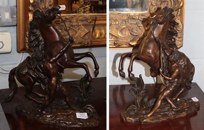 Lot 1272 - A pair of cast bronze Marley horses, After Coustou