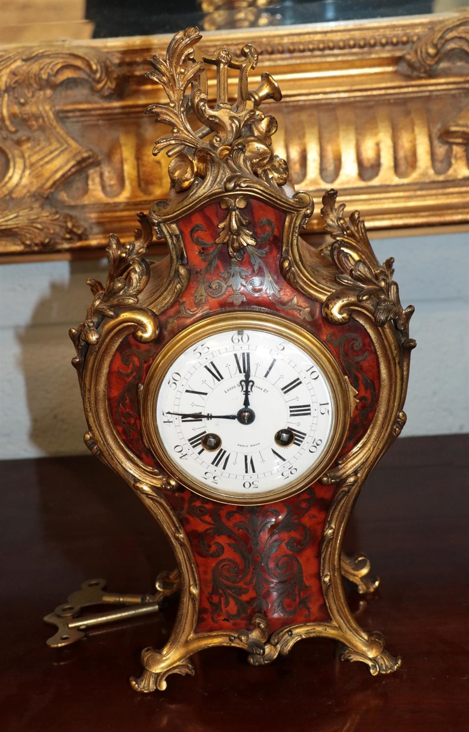 Lot 1273 - A gilt metal mounted and boulle inlaid striking mantle clock, signed to enamel dial Leeds...