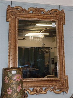 Lot 1278 - A reproduction Italian decorative wall mirror