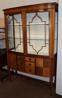 Lot 1279 - An Edwardian inlaid walnut display cabinet