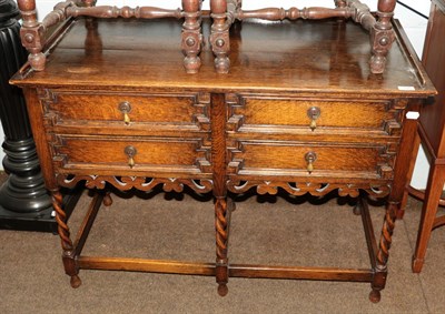 Lot 1280 - A 1920's/30's four-drawer side table