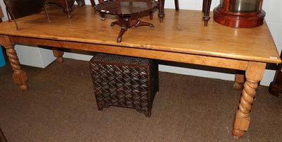 Lot 1286 - A large pine table on spiral turned legs
