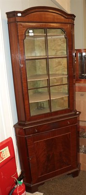 Lot 1292 - A mahogany free standing corner cupboard