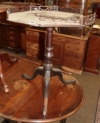 Lot 1294 - A 19th century mahogany gallery top table (a.f.)