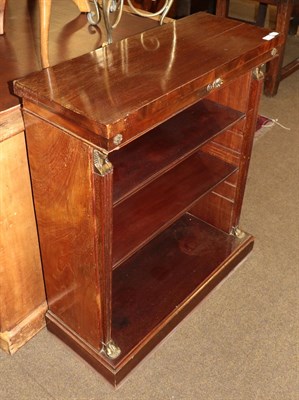 Lot 1300 - An Egyptian revival mahogany free standing bookcase, 74cm wide by 30cm deep by 89cm high